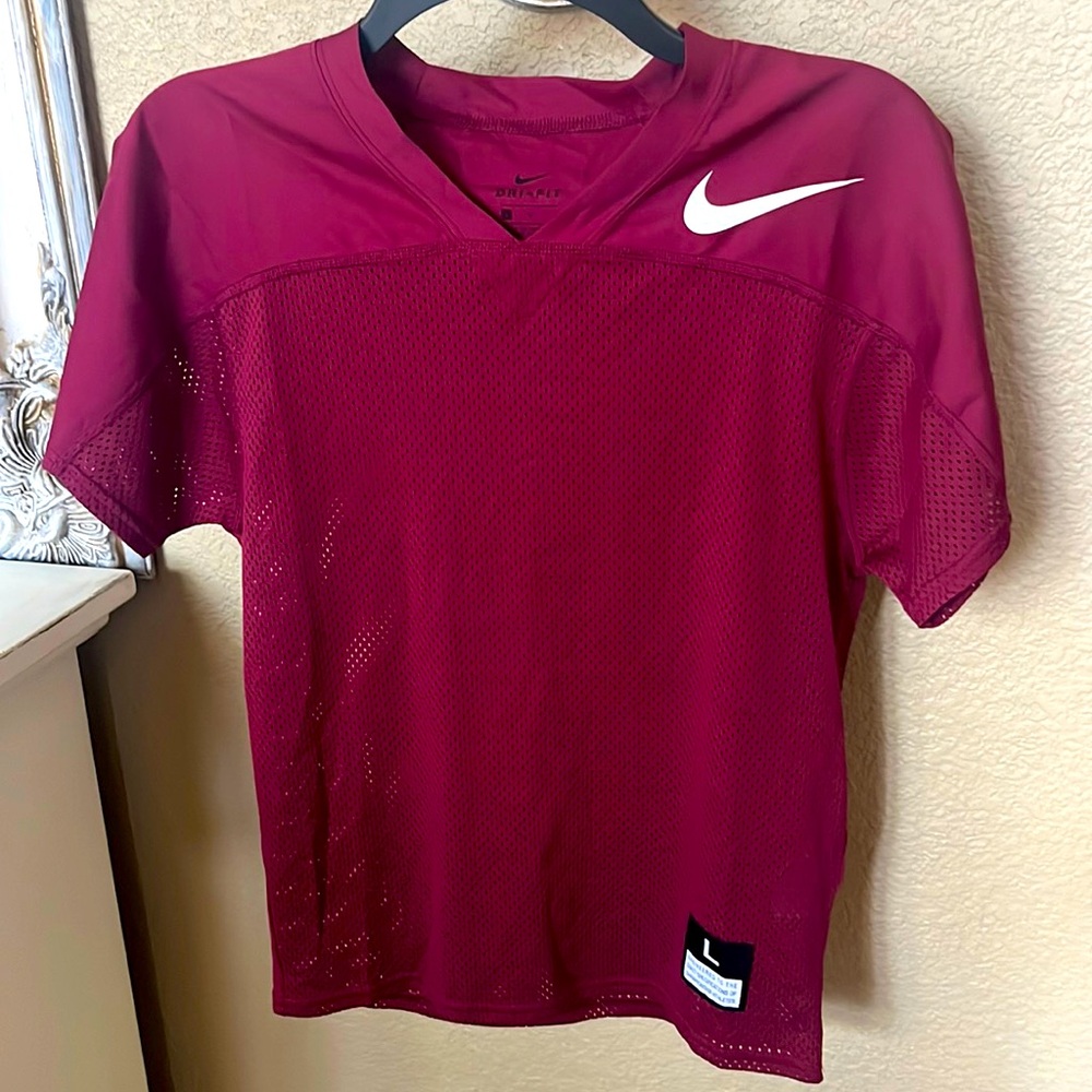 Nike football jersey, youth large.